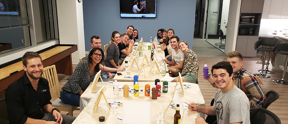 Houston Welcomes New Employees with a Bob Ross-inspired Painting Party