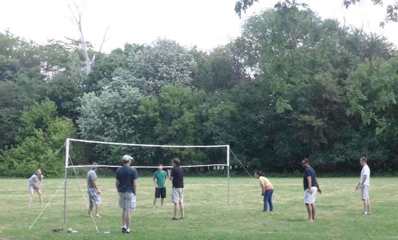 DMC engineers and admin play volleyball in Chicago.