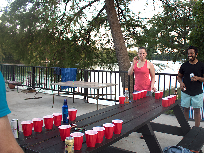 Playing beer pong at the Houston YOE.