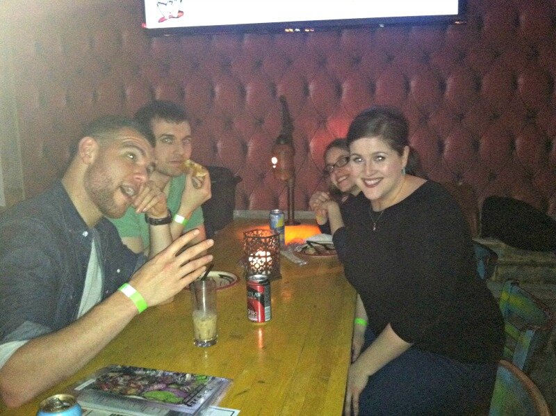 DMC Chicago employees smile for the camera in a Lincoln Park Bar.