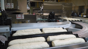 Dough traveling to Oven Infeed