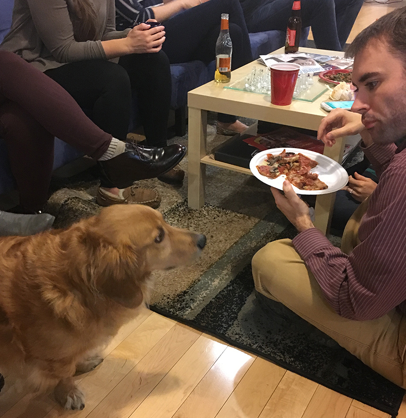 DMC engineer Nick Shea and our office dog, Wiskie, at DMC's autumn happy hour