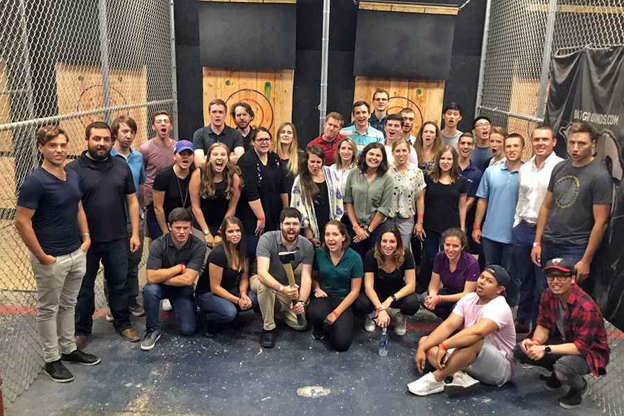 Welcoming new DMC employees with axe throwing