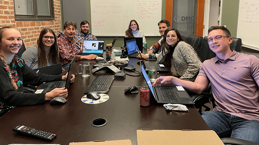 DMC Chicago's Test and Measurement Team Conference Room Group Photo