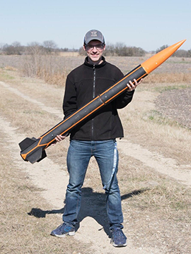 Luke Howe-Kerr Eclipse holding rocket