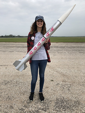 Natalie Pippolo Eclipse holding rocket