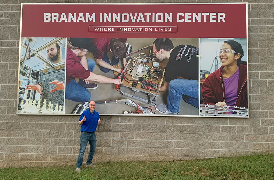 Shay and Bryce in photo on new building at Rose-Hulman