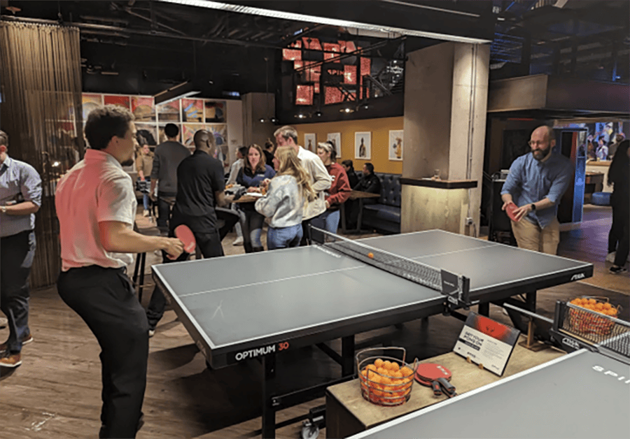 Josh and Jon SPIN Welcome Party playing ping pong