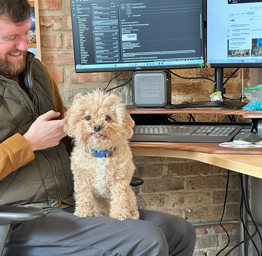 Bently sticking out his tongue in the Chicago office