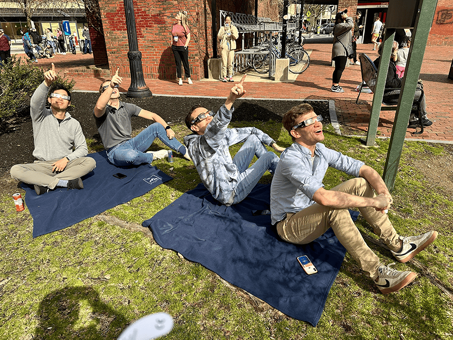 Boston DMCers looking up at the Eclipse