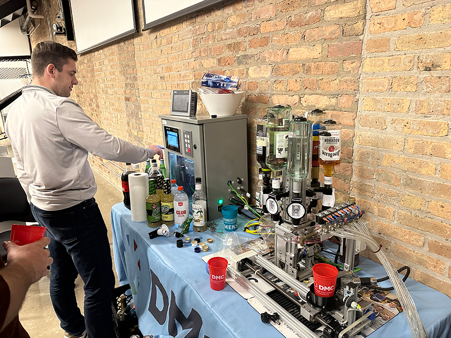 Chicago DMCers getting drinks from DrinkBot!