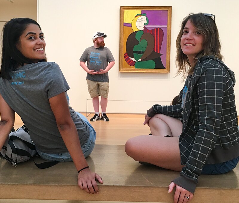 Posing in front of a Picasso painting