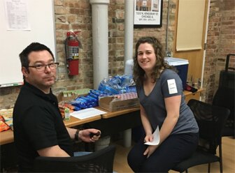 Anne and Leon wait to give blood