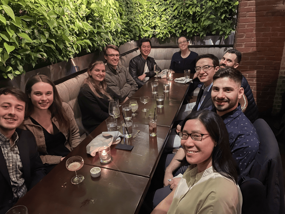 DMC's Boston team seated on an outdoor patio