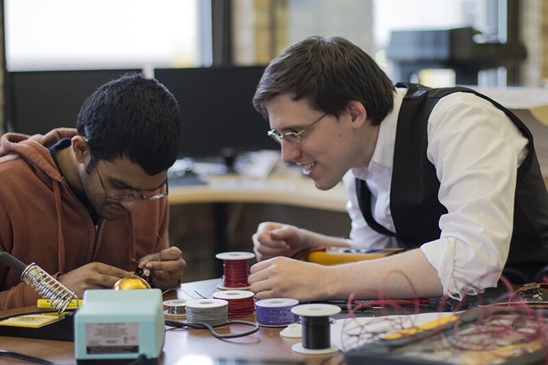 DMC engineers working on building a remote WiFi trigger for the Ping Pong app