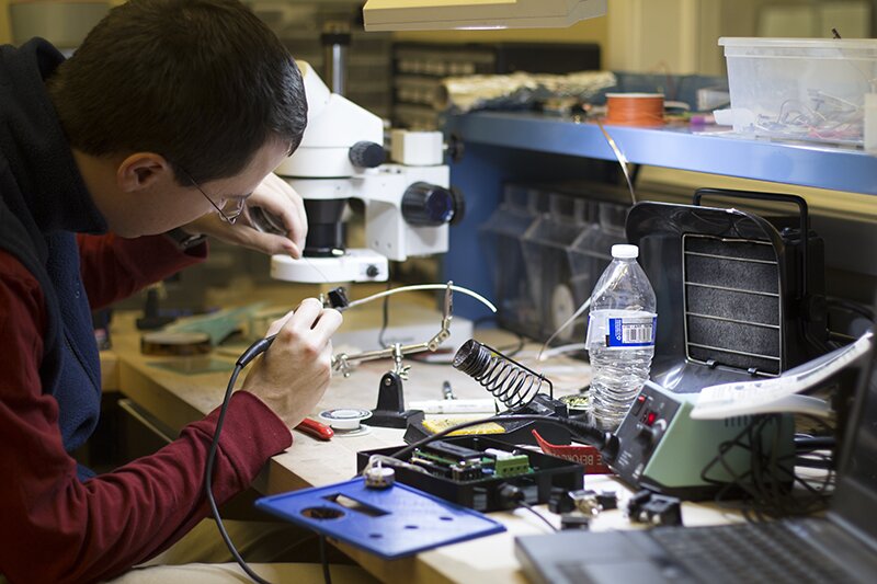 Working on modifications for the X-Carve in DMC's lab on Courier Day 2015