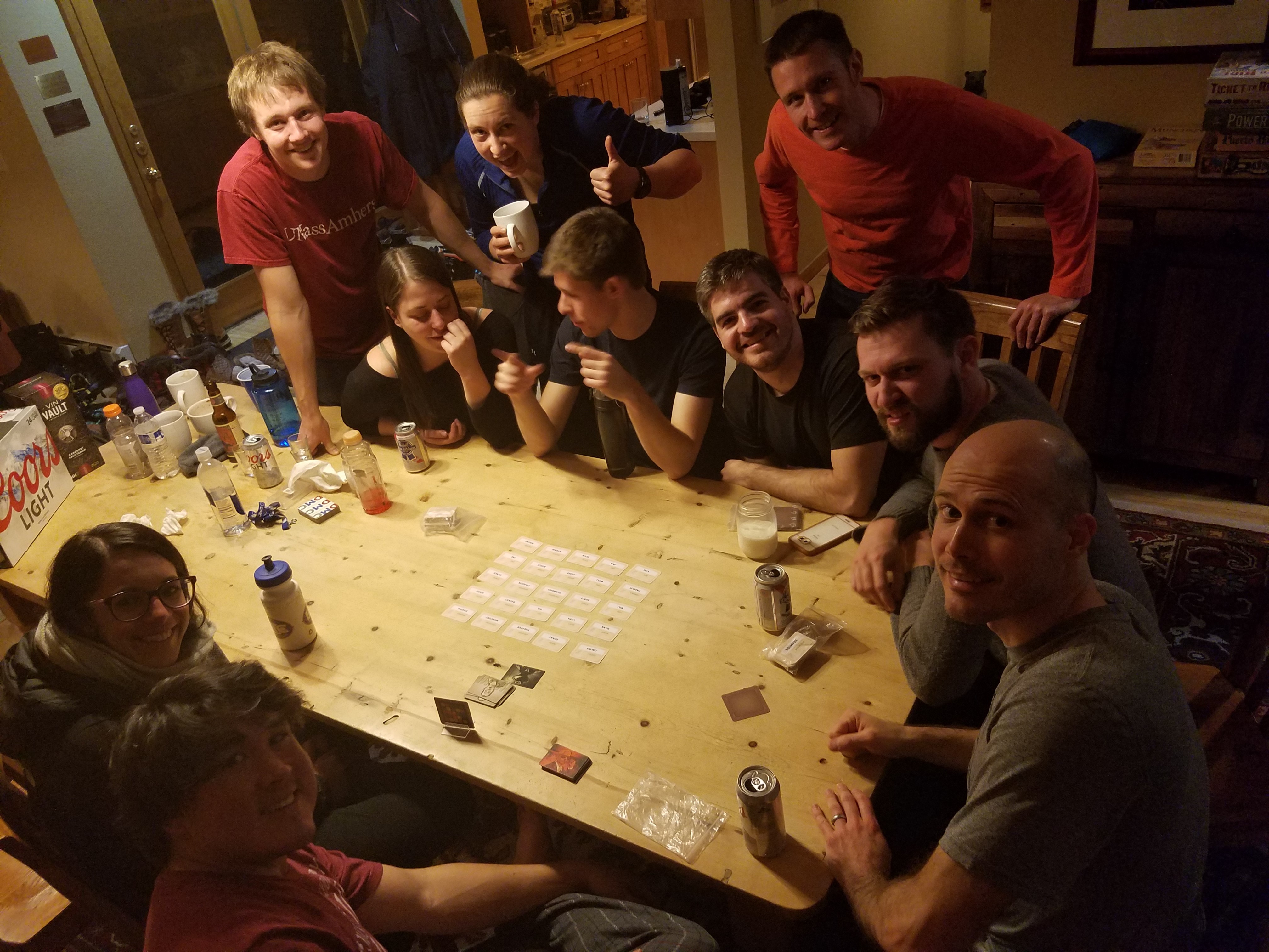 Group photo of DMCers playing Codenames. 