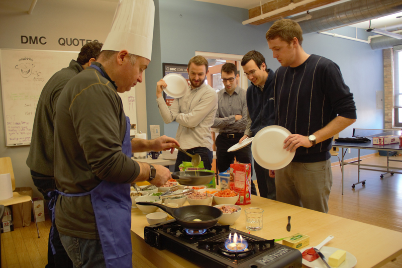 Frank and Jimmy flip omelets for breakfast on FedEx Day and DMC