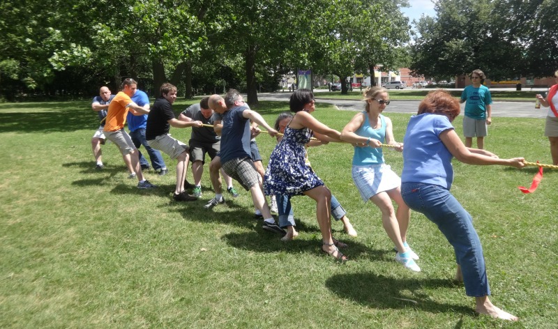 DMC engineers and their families play a game of tug of war in Chicago.