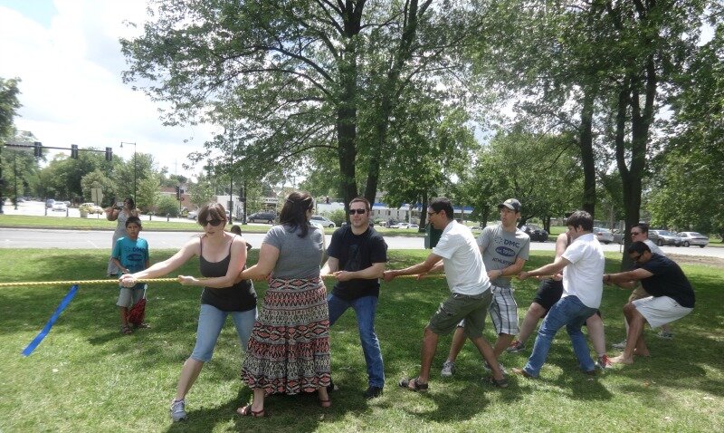 The other side of the DMC tug of war is shown putting forth their effort.