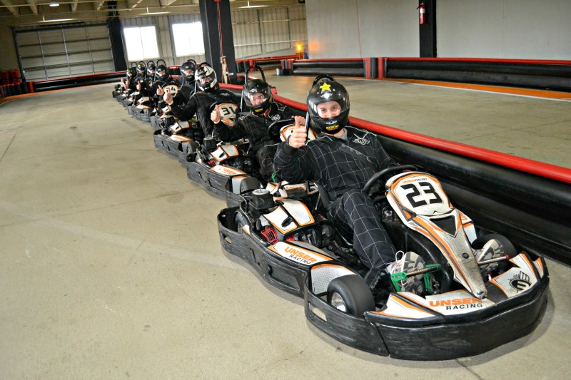 DMC Denver lines up their cars for indoor racing.