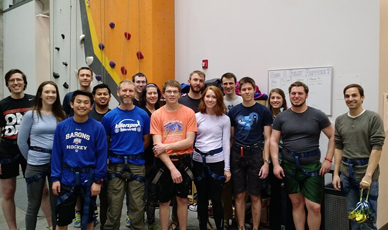 DMC Chicago poses for a group picture at First Ascent's rock climbing gym