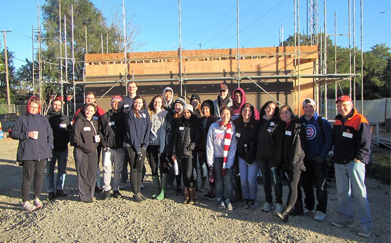 DMC and Habitat for Humanity build team.