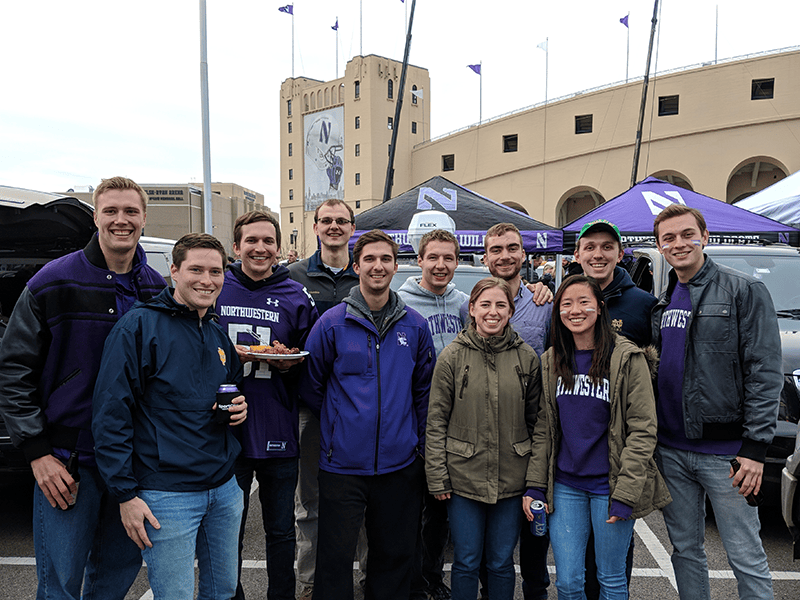 Group photo of DMC employees at Northwestern tailgating.