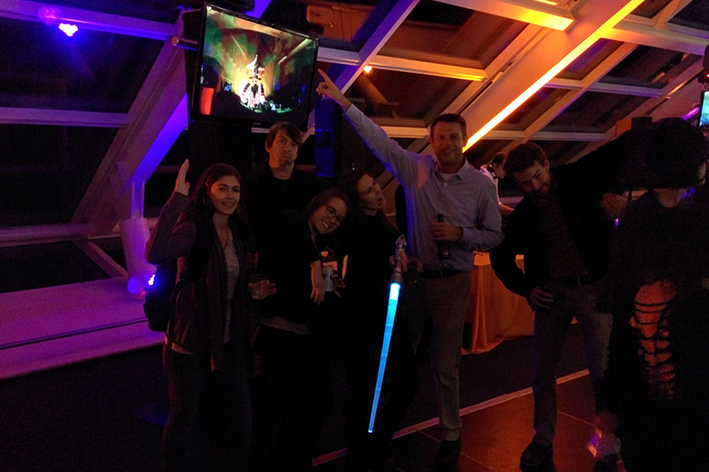 DMC employees on the dance floor at Ji-Hoon's Adler Planetarium welcome party.