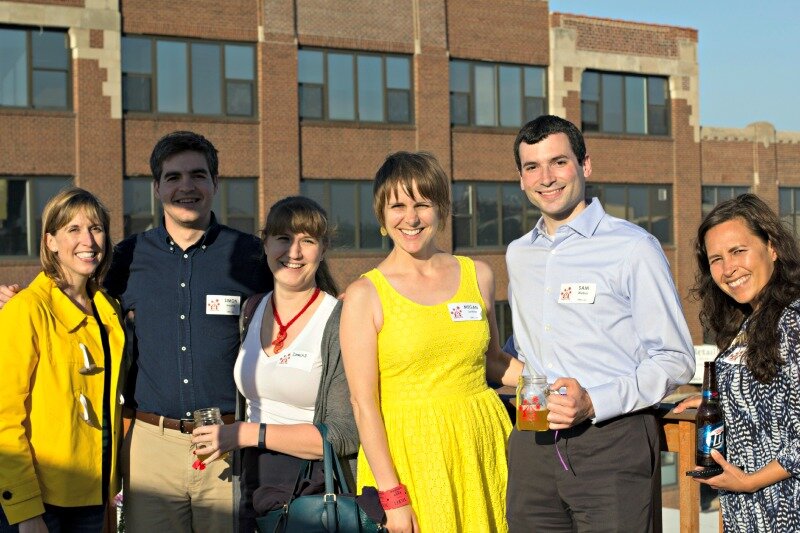 DMC employees enjoy the company rooftop.