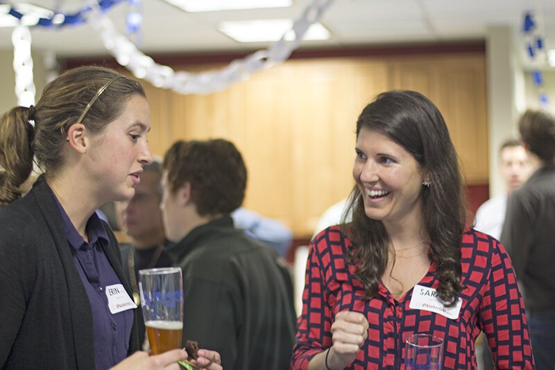 DMC Boston engineers mingle over food and beer at Oktoberfest.