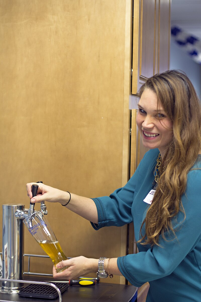 Jessica tastes some homebnrewed beer at DMC Boston.