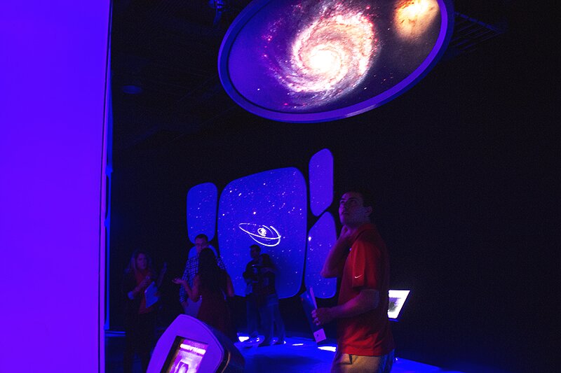 DMC employee Jason W. wandering around the Milky Way at a welcome party at the Adler Planetarium.