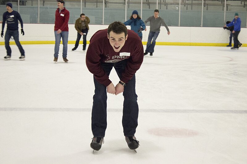 DMC Chicago employees ice skating during the All Day Company Meeting