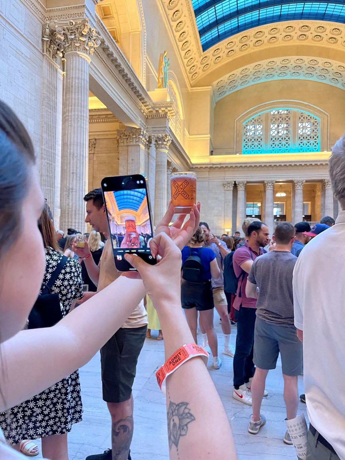 DMC Chicago taking a photo at Beer Under Glass 2022