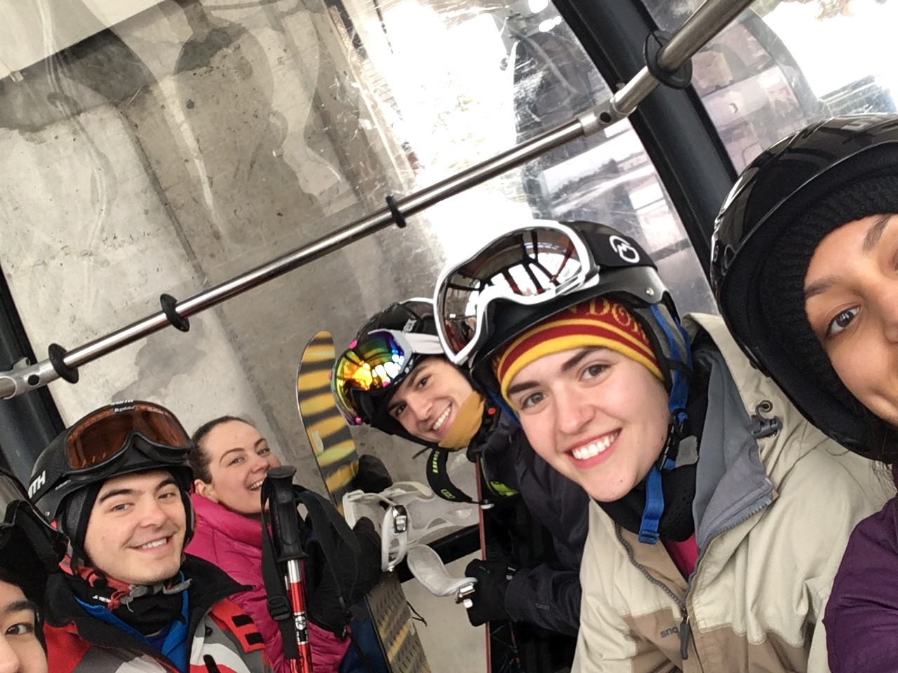Group photo of DMCers riding a gondola at Keystone. 