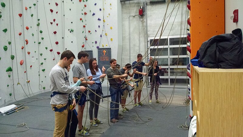 DMC learning how to tie knots for rock climbing