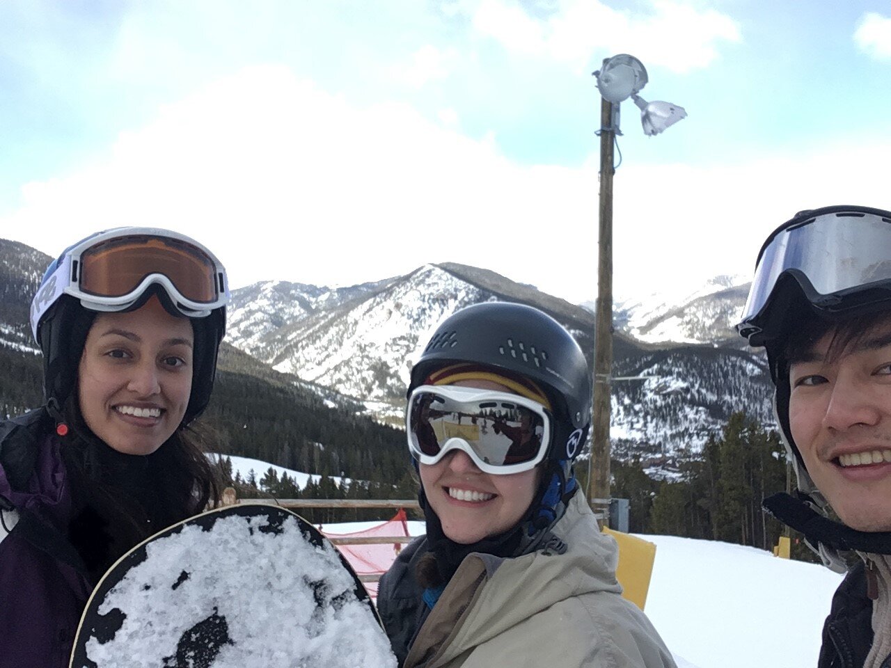 Serena and Becca with a snowboard. 