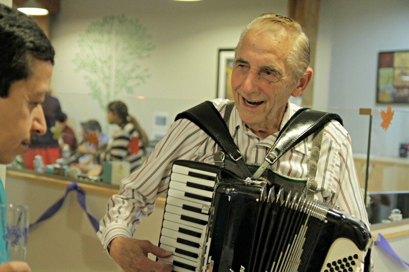 The accordian player entertains guests at DMC.