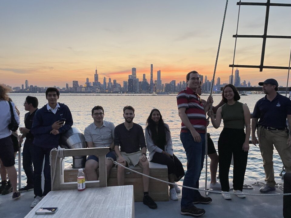 A group of people on a sailboat.