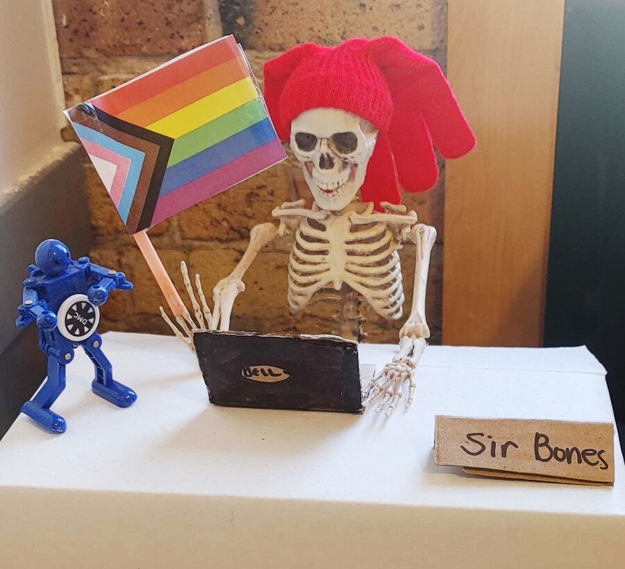 DMC Chicago Admin mascot Sir Bones with Pride Flag