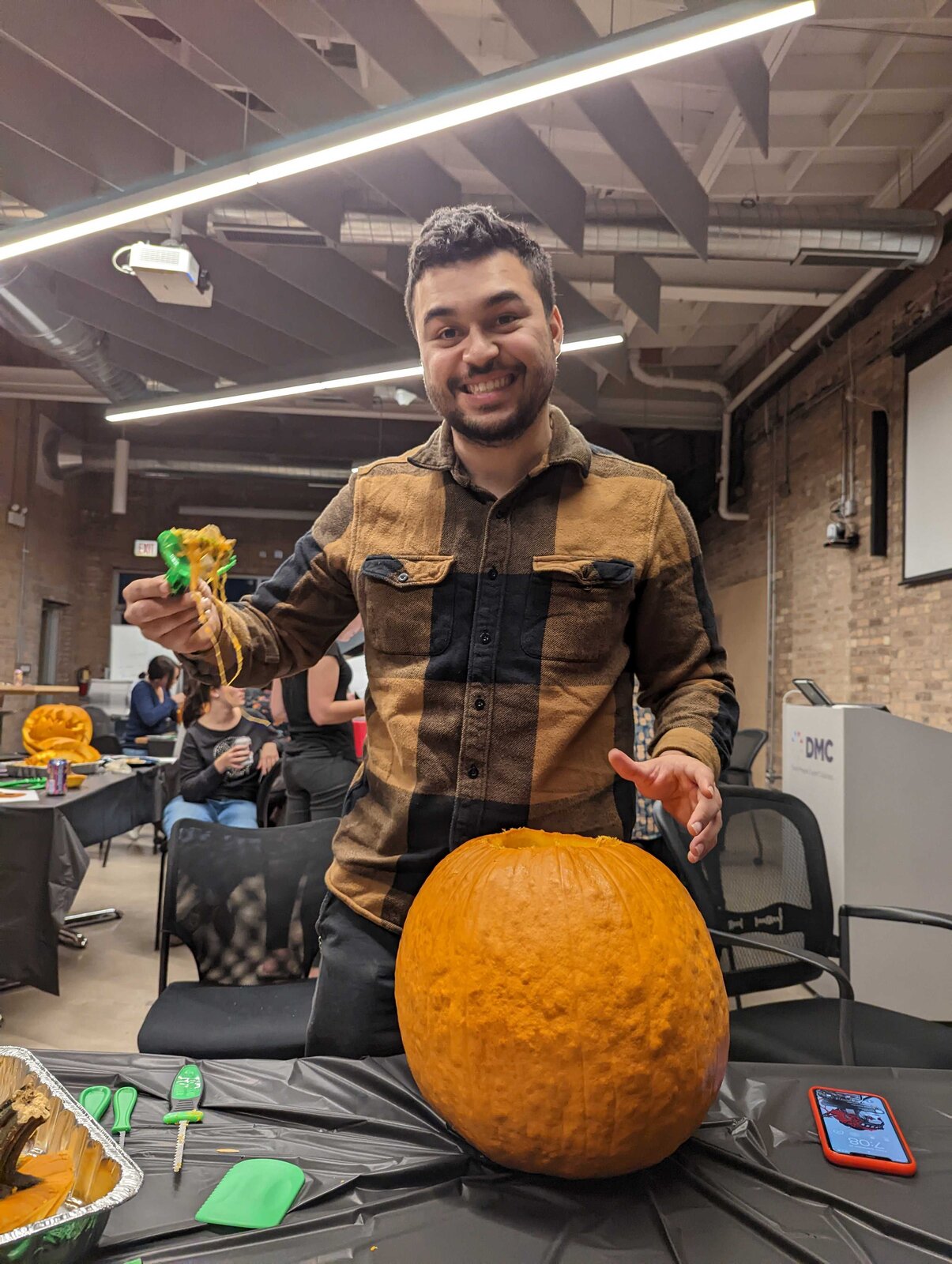 Scooping a pumpkin