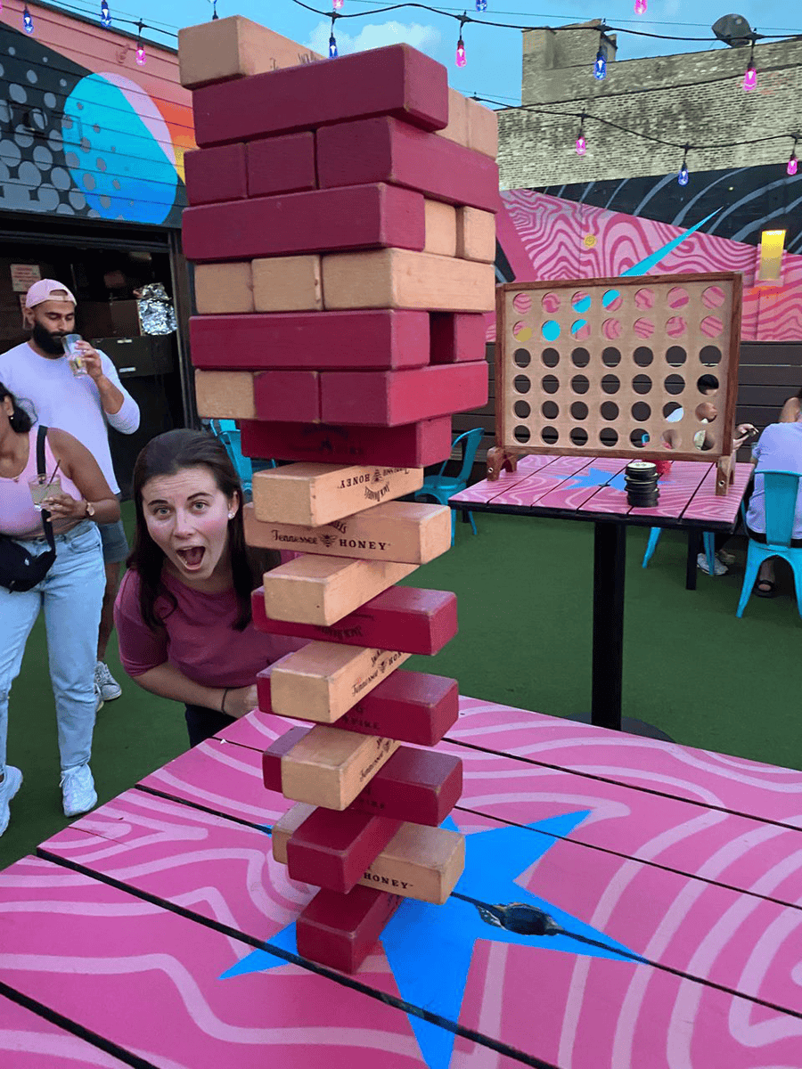 DMC Chicago plays giant Jenga.