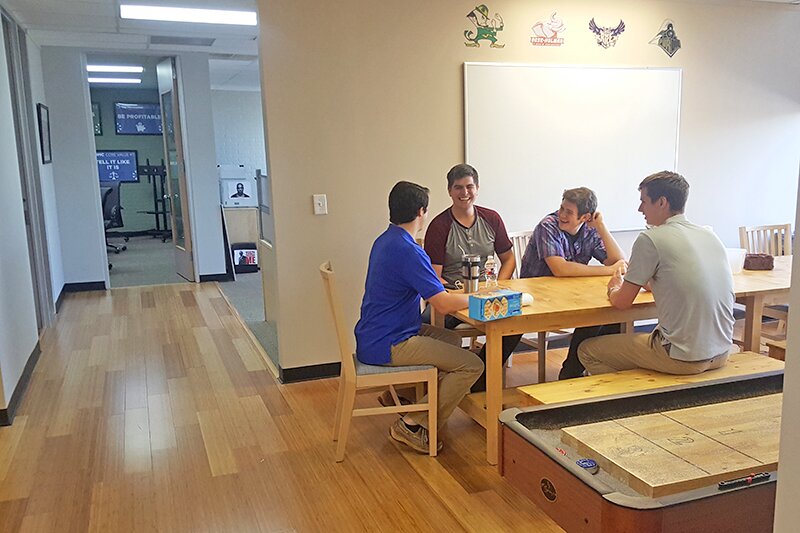 The DMC Houston team enjoys their newly expanded office kitchen