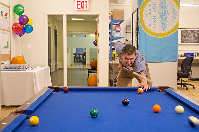 DMC employees and customers competed on the pool table in New York