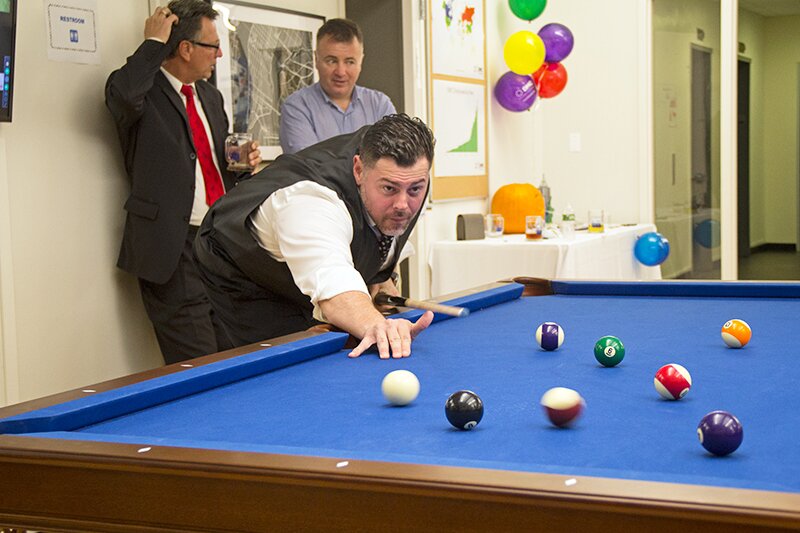 The pool table was popular at DMC New York's grand opening