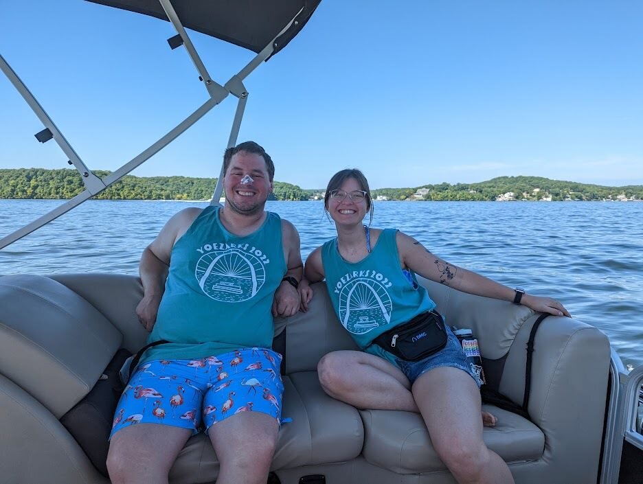 Two people riding in a boat