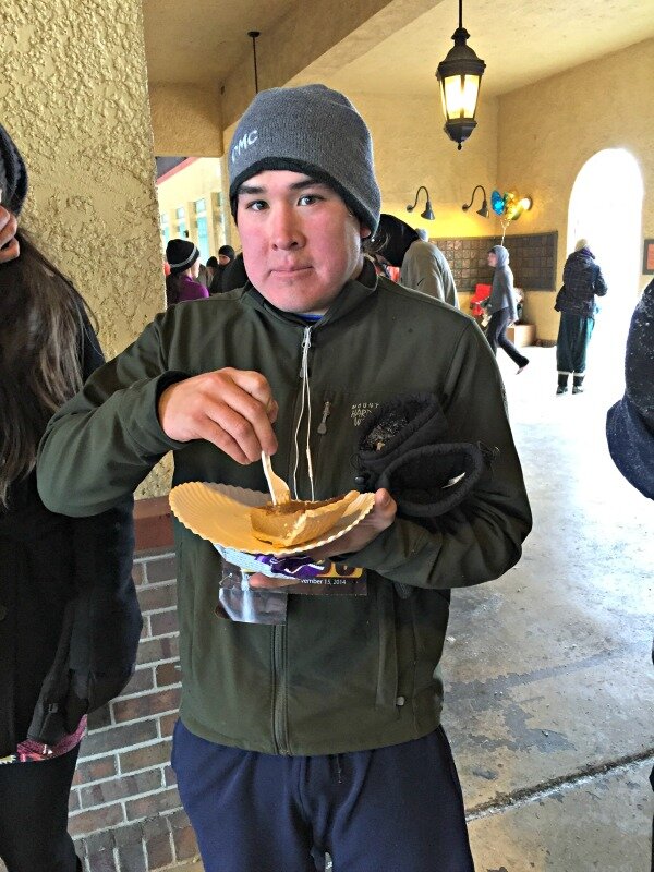 DMC Denver engineer Jimmy enjoys a slice of pie after the race.