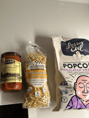 A bag of food and a can of sauceDescription automatically generated