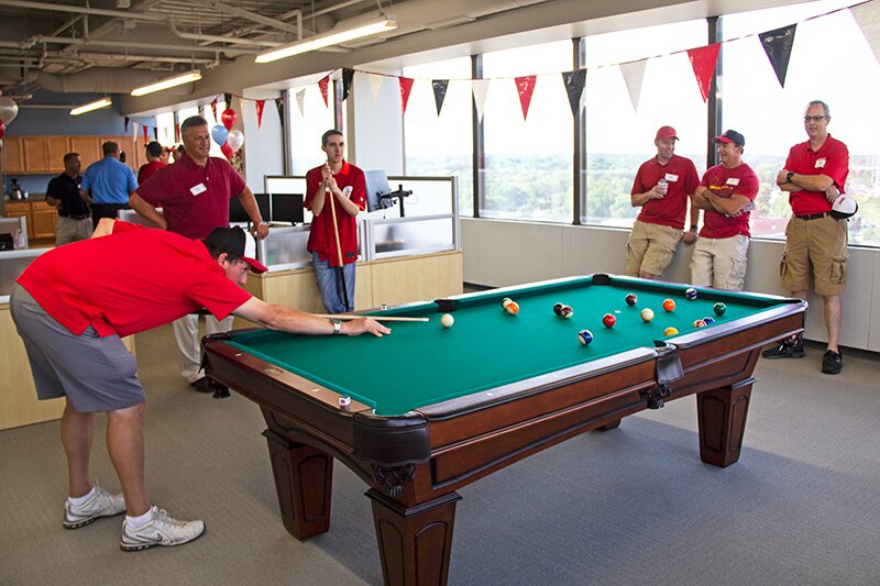 Guests play pool at DMC St. Louis